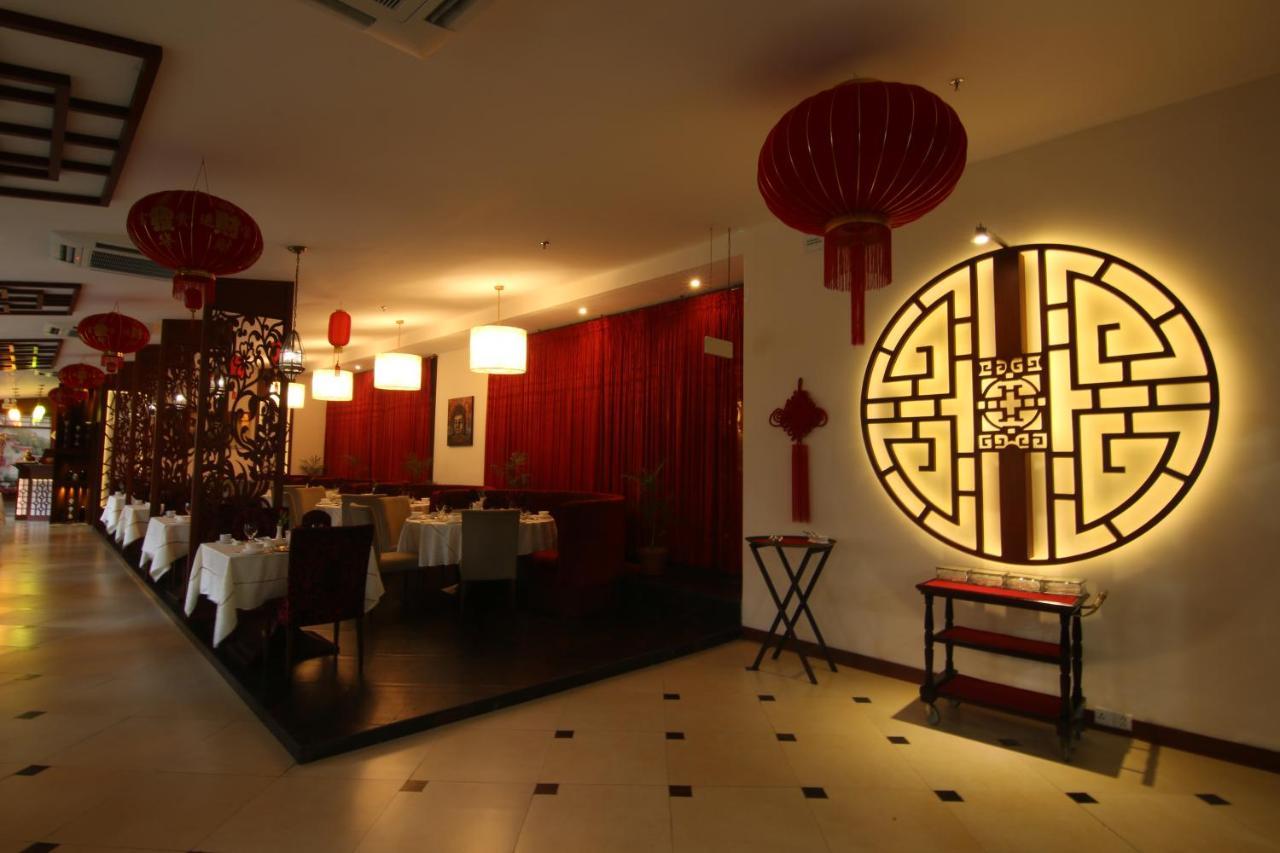 Ramada Plaza By Wyndham Karachi Airport Hotel Ngoại thất bức ảnh Interior of a restaurant in Beijing